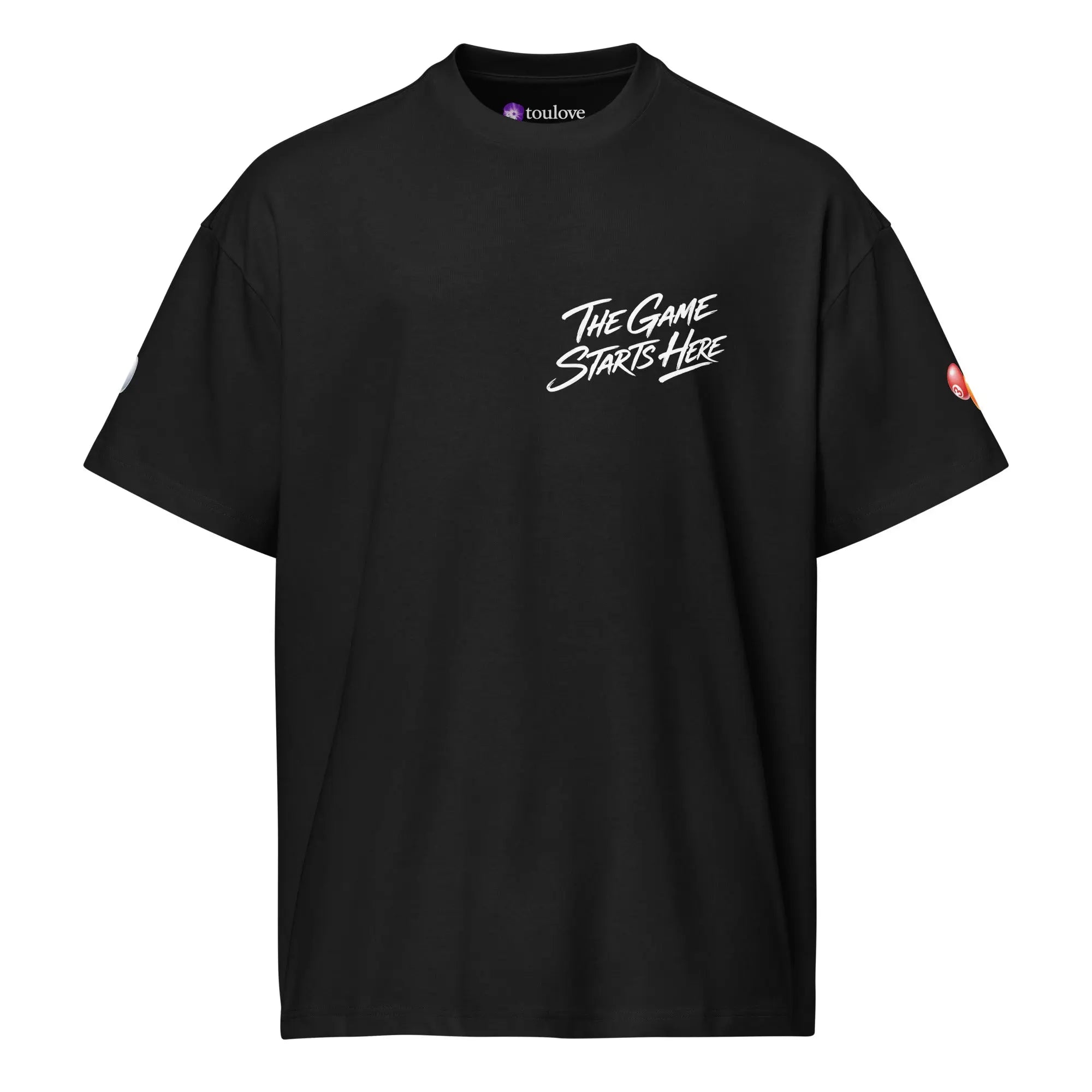 T-shirt boxy imprimé noir homme avec texte The Game Starts Here sur la poitrine.