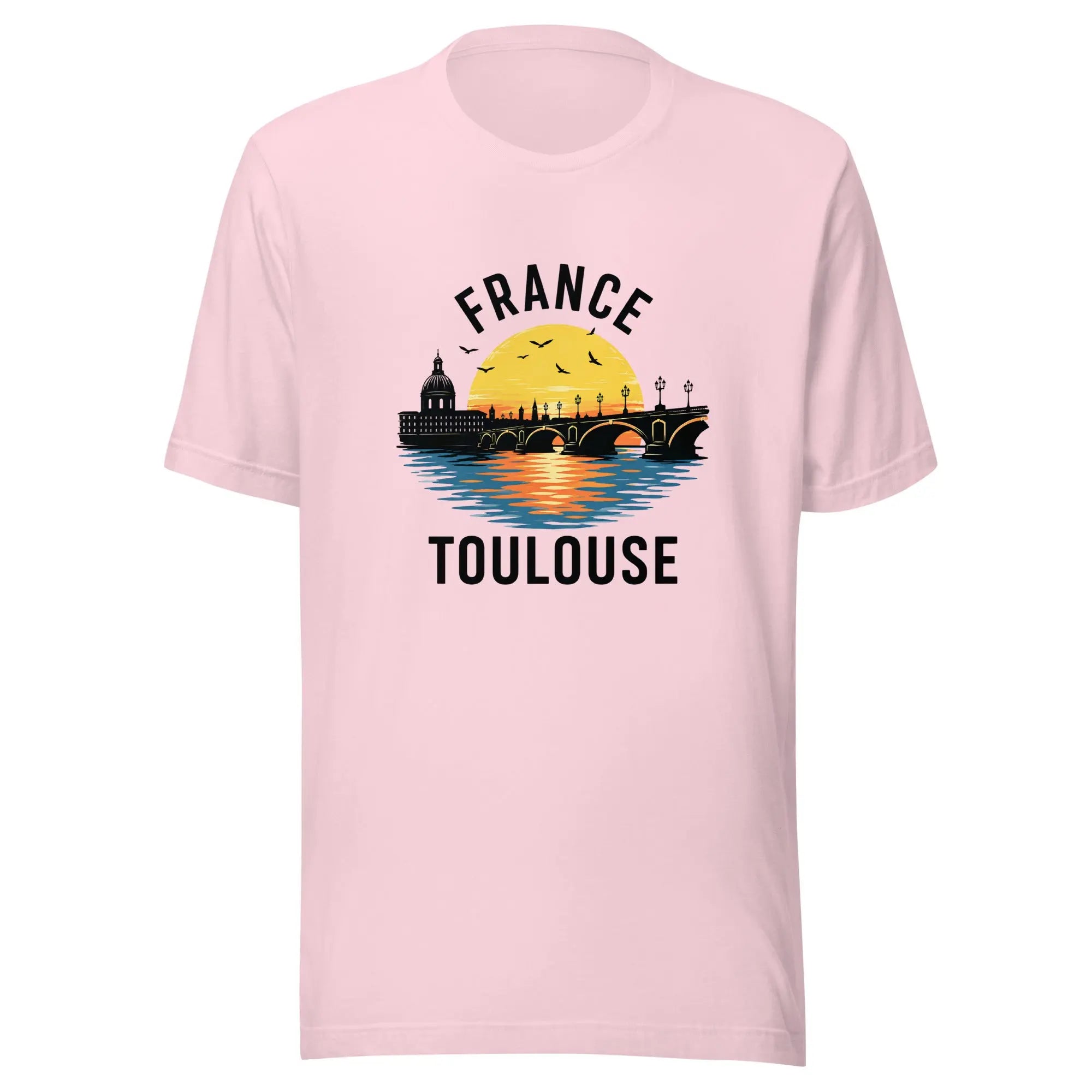 T-shirt imprimé rose unisexe avec design France Toulouse et paysage urbain au coucher du soleil.